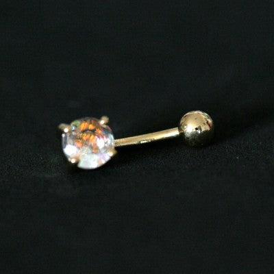 Piercing de umbigo da Tal da Realeza em um fundo preto aveludado. A peça possui uma zircônia em uma das extremidades.